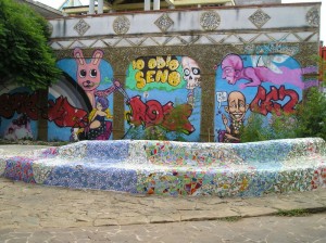 Art on the outside wall, and one of the fountains