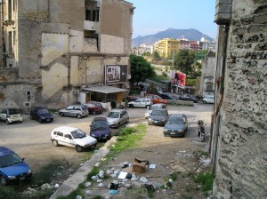 This is what large parts of Palermo look like, cars parked randomly and garbage on the ground.