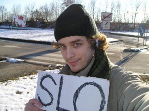 Hitching out of Graz ('SLO' is an EU abbreviation for Slovenia), I'm impressed I managed to get the leaving-Graz sign in the background.