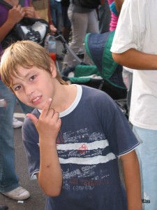 Kid This kid was kind of awesome. I was taking a picture of something else, and he asked 'Were you taking my photo?' and I said, 'No,' and he was like, 'Why not? I'm totally handsome. You should take my photo,' and then he struck this pose. So here you go, kid.